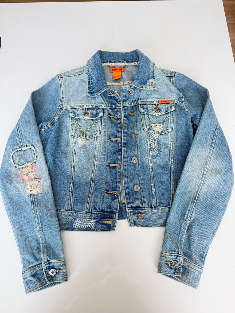 Zanadi Light Blue Distressed Denim Jacket with Patch Details